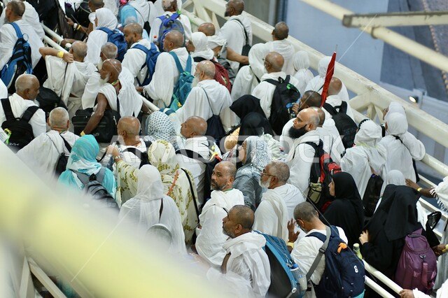 Holy cities and religious places, performing Hajj and Umrah rituals, the Grand Mosque in Mecca, a close-up of pilgrims and Umrah performers in the courtyard of the Grand Mosque in Mecca, Saudi Arabia, during the day, worship and drawing closer to God