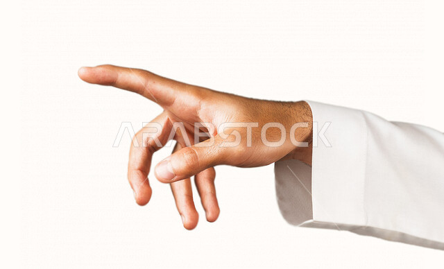 Close-up of the hand of a Saudi Arabian Gulf man making a gesture with his index finger, different physical gestures