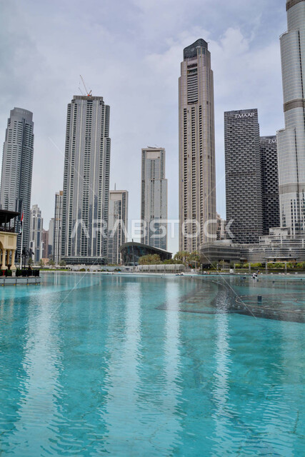 Urban growth, progress, civilizational development and the establishment of coastal tourist cities in Dubai, the advanced architectural art of commercial and residential facilities, luxury buildings and resorts in the United Arab Emirates, the reflection of the image of skyscrapers and high towers on the sea waters