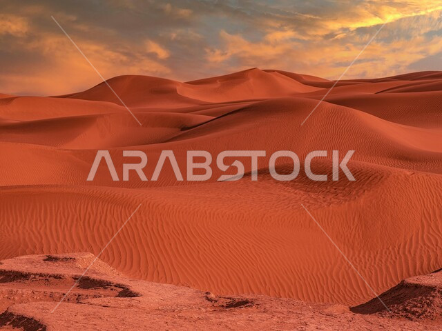 البيئة الرملية في وقت النهار، الهضاب والتلال في المناطق الطبيعية الصحراوية، الرمال الذهبية الناعمة والكثبان في صحراء المملكة العربية السعودية، المناظر الطبيعية في صحاري شبه الجزيرة 