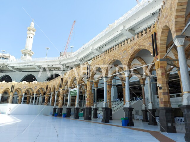 The courtyards of the Grand Mosque in Mecca, the Holy Mosque in Saudi Arabia, performing Hajj and Umrah rituals, Islamic religious landmarks and sacred places, arches and columns in the Islamic style