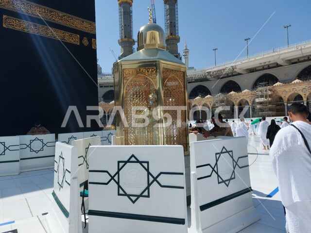 The shrine of our master Ibrahim in the courtyards of the Grand Mosque in Mecca, pilgrims to the House of God, circumambulating the Kaaba in Mecca, performing the Hajj and Umrah rituals, sacred Islamic religious places and landmarks in the Kingdom of Saudi Arabia