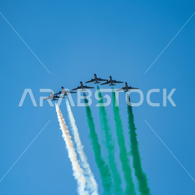 Remembering the Saudi National Day on September 23, showing loyalty and love for the Saudi state, celebrating national holidays and events, presenting air shows in the skies of the Kingdom of Saudi Arabia, displaying the aviation team on the Saudi National Day, Flag Day activities on March 11