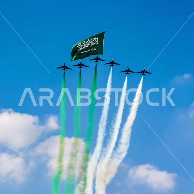 Remembering the Saudi National Day on September 23, showing loyalty and love for the Saudi state, celebrating national holidays and events, presenting air shows in the skies of the Kingdom of Saudi Arabia, displaying the aviation team on the Saudi National Day, Flag Day activities on March 11