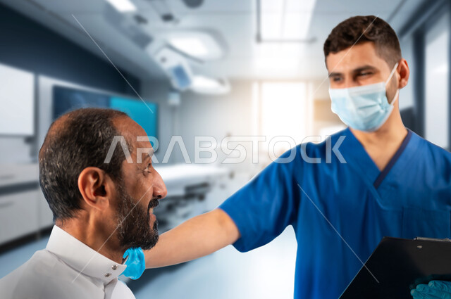 العمل في القطاع الصحي, تدوين نتائج الفحوصات والتحاليل بالسجل الطبي، ممرض عربي خليجي سعودي يرتدي قناع الوجه يقف مع المريض يقوم بتسجيل بياناته في الملفات، تقديم الخدمات العلاجية للمرضى, مهن ووظائف متنوعة في المملكة العربية السعودية