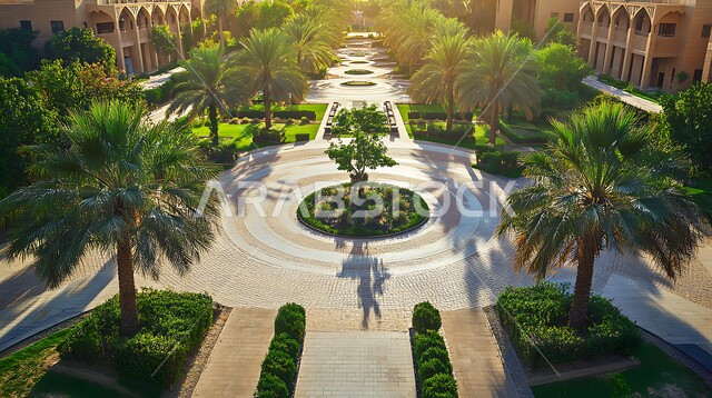 الاهتمام في زراعة النباتات الخضراء و التشجير, مفهوم التعليم العالي في المملكة, الحدائق و المباني على الطراز العربي التقليدي في وقت النهار ,صورة من الاعلى للفن الهندسي المعماري للجامعات في السعودية