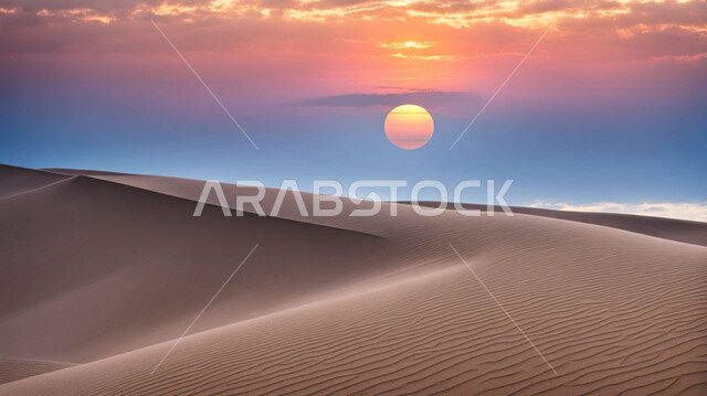 Sand formations and hills in the desert, dunes and soft golden sand in desert areas, landscapes in the Kingdom of Saudi Arabia at sunset, recreational safaris, view of clouds in the sky