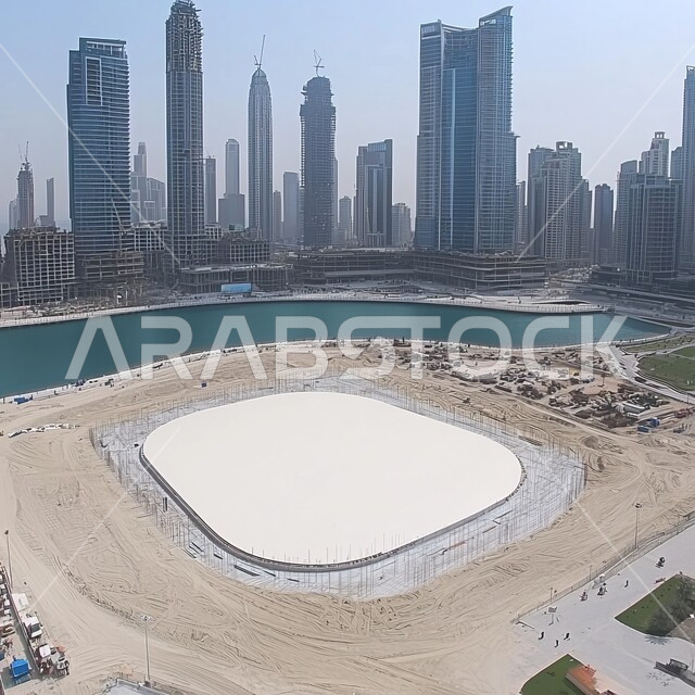 الفن الهندسي المعماري المتميز على الطراز الحديث والمتطور لبناء المباني وناطحات السحاب في مدينة دبي, موقع بناء ناطحات سحاب حديثة في مشهد صحراوي، مفهوم تحسين البنية التحتية للبلاد، أعمال البناء والمقاولات والتطوير العقاري، إنشاء الأساسات والهياكل للمشروعات السكنية والمصانع، تشييد المباني والمشاريع الضخمة