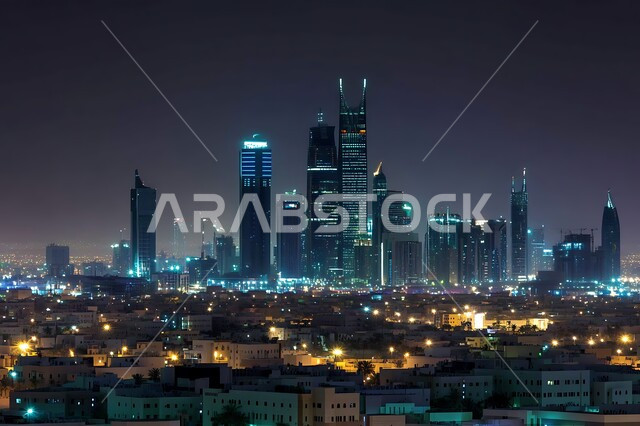 An imaginative future view of urban progress and growth for commercial facilities and buildings, the concept of developing and improving infrastructure, the architectural engineering art of towers and skyscrapers illuminated at night, a Saudi future vision 2030,