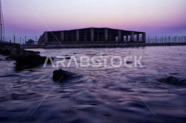 Famous tourist places, historical monuments at sunset, the seafront of the ruins of Al-Uqair Port on the coast of the Arabian Gulf, a picture of Al-Uqair Castle in Al-Ahsa Governorate in the Kingdom of Saudi Arabia, forts and castles in coastal cities