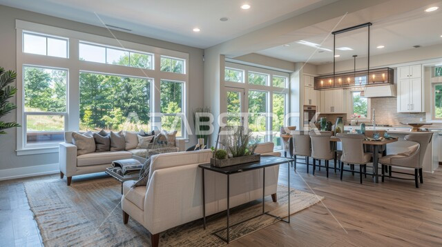 الديكورات الداخلية الراقية للفلل و الشقق السكنية في المملكة العربية السعودية, التصاميم الأنيقة لغرف الجلوس المريحة على الطراز الحديث, الواجهات و النوافذ الزجاجية الكبيرة, غرفة معيشة مع أثاث منزلي فاخر