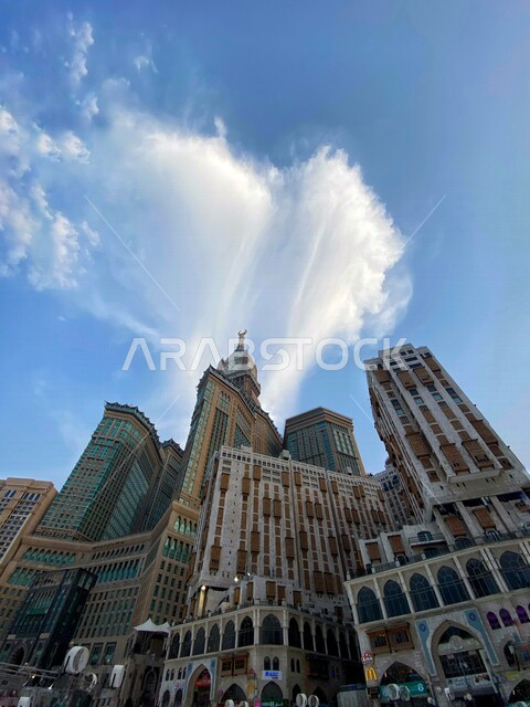 Depiction of the towers of the Grand Mosque in Mecca and the clock tower in Mecca from an upper angle in the Kingdom of Saudi Arabia, the House of God, the Holy Mosque in Mecca, the beauty of the Kingdom of Saudi Arabia