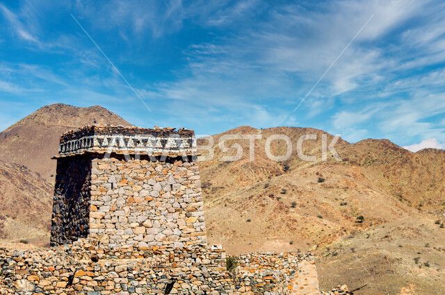 Old style architecture, famous tourist attractions, heritage stone castles during the day, ancient stone houses and buildings, old heritage village house in Al Baha region in Saudi Arabia, nature background