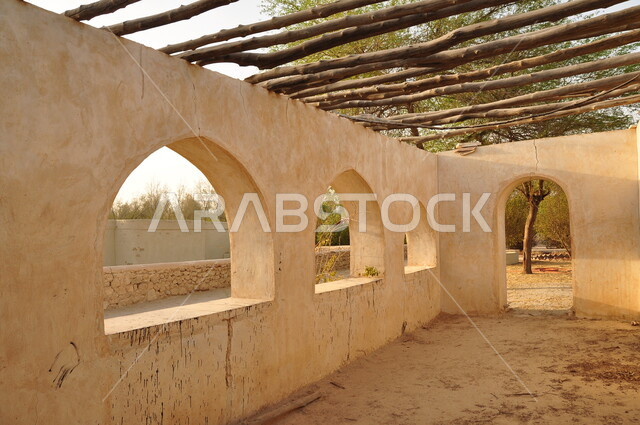 An ancient mosque made of clay and white stone, the Juwata Mosque in the Al-Ahsa region of the Kingdom of Saudi Arabia, old-style architecture, Islamic and worship, historical religious archaeological sites
