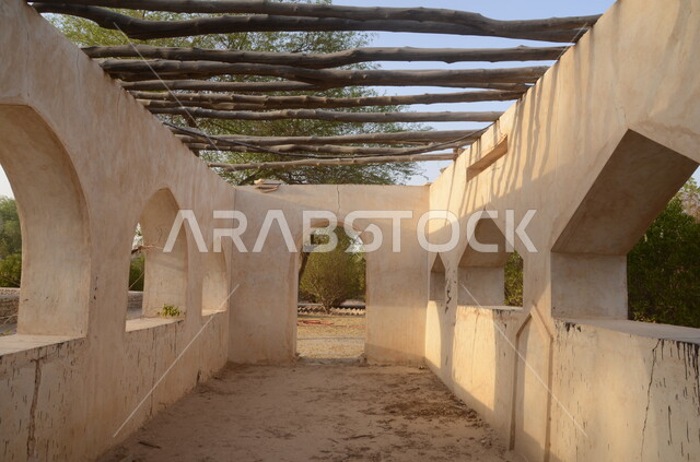 An ancient mosque made of clay and white stone, the Juwata Mosque in the Al-Ahsa region of the Kingdom of Saudi Arabia, old-style architecture, Islamic and worship, historical religious archaeological sites