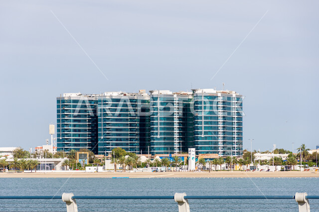 Urban development and progress of buildings and facilities in the Emirates, interest in planting trees and green spaces, famous tourist attractions in Abu Dhabi, places of attraction and attraction for tourists, the waterfront on the coast of the Arabian Gulf, the architectural art of towers and skyscrapers