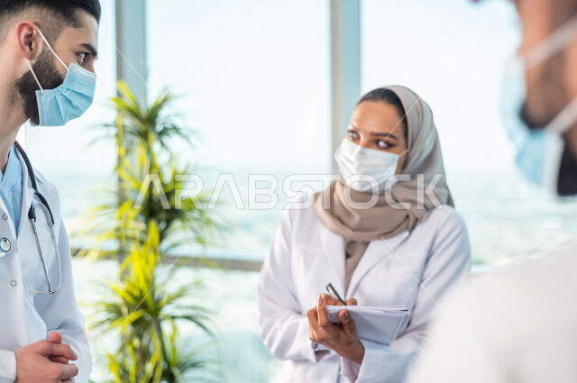 A Saudi Arabian Gulf medical team, the exchange of medical consultations, the teamwork of doctors, commitment to preventive measures against the Corona virus, the concept of medicine and health care