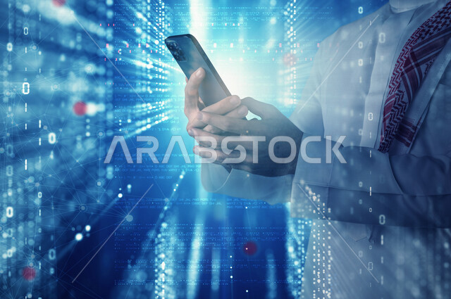 صورة يد شاب سعودي خليجي يعمل في وظيفة مطور ويب، استخدام لغات البرمجة، تطوير وبناء المواقع والتطبيقات الالكترونية، اكواد برمجية لبناء تطبيقات الهواتف الذكية