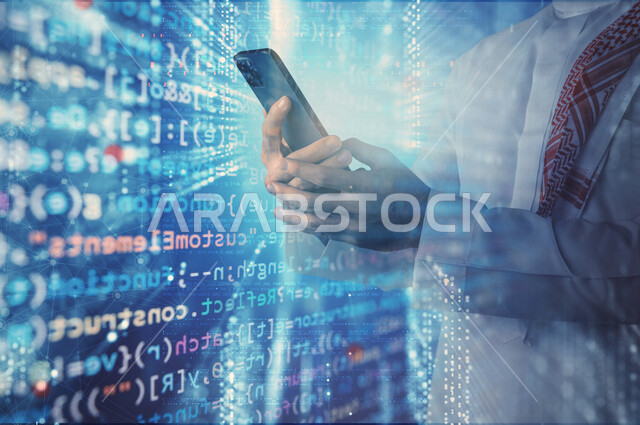 صورة يد شاب سعودي خليجي يعمل في وظيفة مطور ويب، استخدام لغات البرمجة، تطوير وبناء المواقع والتطبيقات الالكترونية، اكواد برمجية لبناء تطبيقات الهواتف الذكية