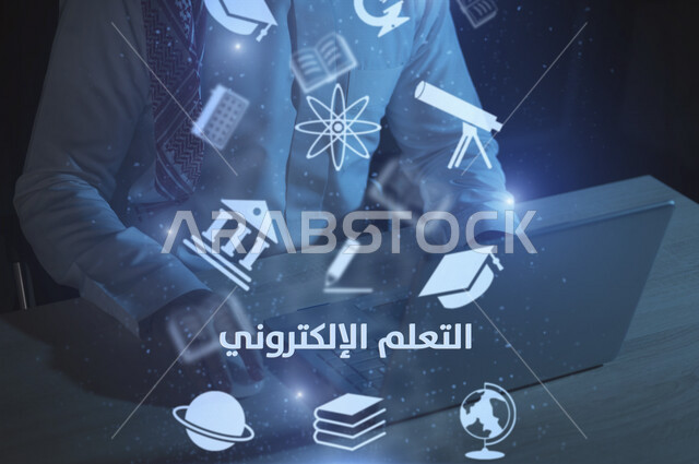 A Saudi Arabian Gulf employee working on the development of e-learning programs, the distance education system in the Kingdom, school and educational icons and graphics using the 3D hologram feature, education in the Kingdom of Saudi Arabia