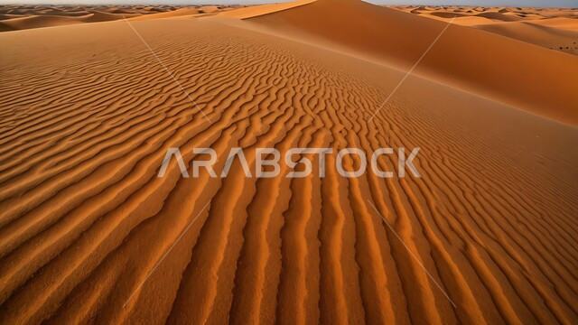 Sand formations and formations in deserts, harsh and dry weather in arid lands, landscape and soft golden sand in desert during the day, soft golden dunes and natural terrain in Saudi Arabia, nature background