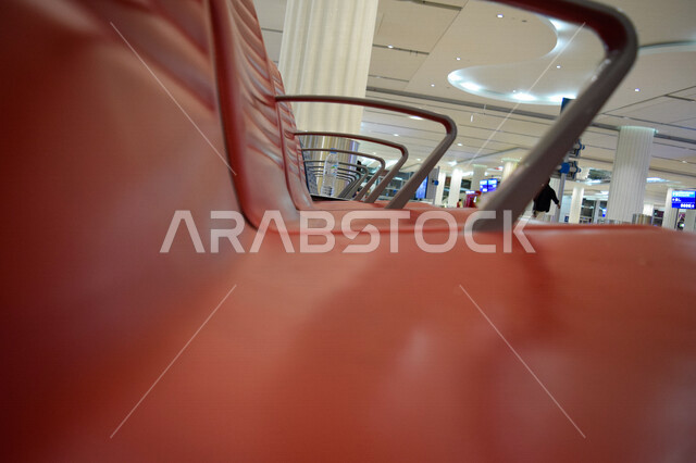 Picture of leather seats in the waiting area inside Dubai International Airport in the United Arab Emirates, airport services, waiting halls, tourism in the Emirates
