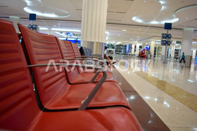 Picture of leather seats in the waiting area inside Dubai International Airport in the United Arab Emirates, airport services, waiting halls, tourism in the Emirates