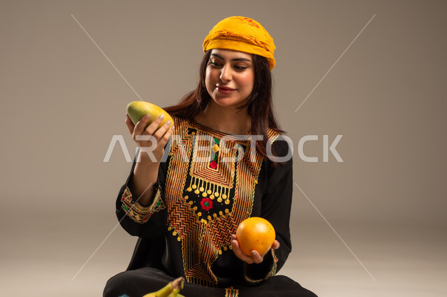 Local agricultural products and crops, the anniversary of the founding of the first Saudi state, February 22, celebrating national occasions, a close-up portrait of a young Saudi Arabian Gulf woman wearing a sheila and a sidr tree holding a straw basket full of fresh fruits, the day of our beginning, 1727 AD, beige background
