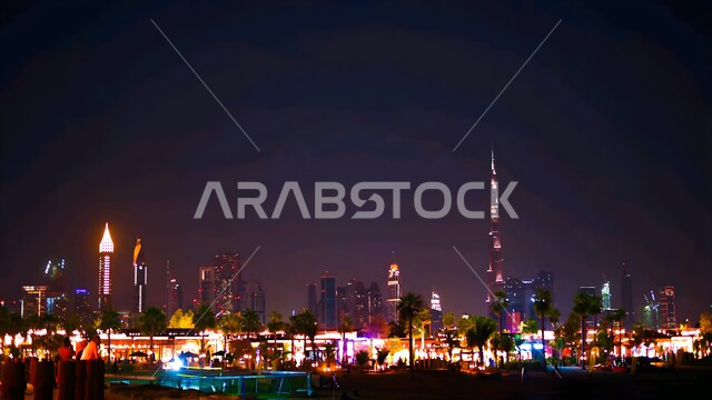 الفن الهندسي المعماري على الطراز الحديث للأبراج وناطحات السحاب في مدينة دبي، معالم وأماكن سياحية مشهورة, المباني والمنشآت السكنية والتجارية المضيئة ليلا في الامارات العربية المتحدة, جذب واستقطاب السياح من أنحاء العالم, النمو والتطور العمراني على ساحل الخليج