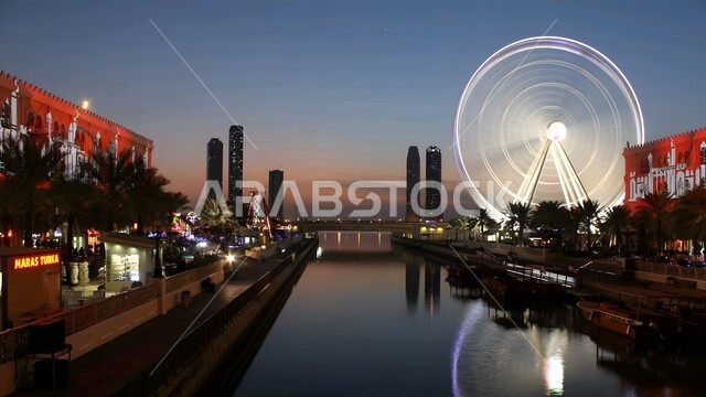 Ain Dubai illuminated at night in the United Arab Emirates, the waterfront on the Arabian Gulf coast, the architectural art of towers, skyscrapers and facilities overlooking the sea, tourist attractions and attractions, famous coastal landmarks and tourist places