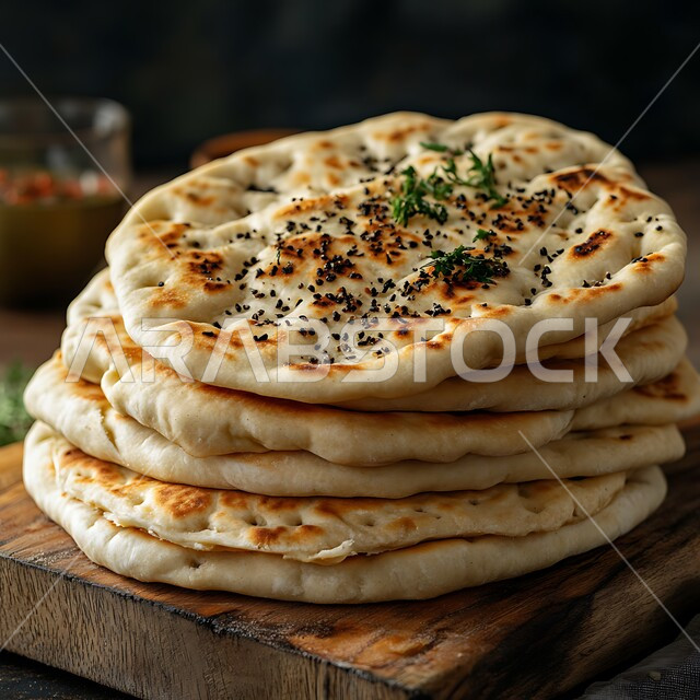 أرغفة الخبز العربي التقليدي، الخبز المفرود والمرقوق في الافران العربية الشعبية, إعداد المعجنات والمخبوزات الشهية في المخابز في المملكة العربية السعودية، خبز ساخن طازج، منتجات وطنية محلية