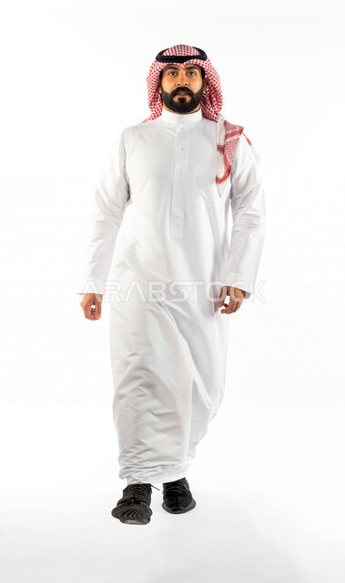 Portrait of a Saudi Gulf man doing a photo session, looking at the camera with different facial and hand gestures, white background of a Saudi Muslim man in traditional Saudi costume with shemagh and agal, full body, full length portrait