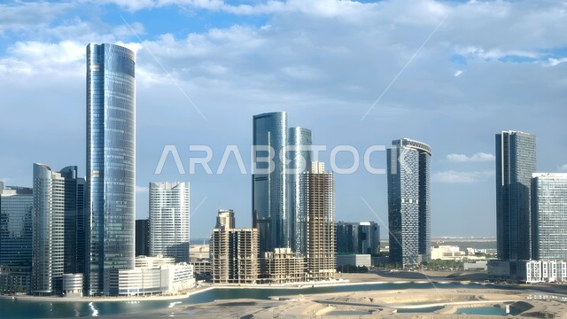 Tourist attractions, the waterfront on the Arabian Gulf coast, the development and urban progress of buildings and facilities in the United Arab Emirates, the architectural art of towers and skyscrapers in the city of Abu Dhabi, famous cities and tourist attractions