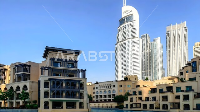 أبراج داون تاون دبي مول، التطور والنمو العمراني للمباني والمنشآت التجارية، جذب واستقطاب السياح من انحاء العالم، فندق العنوان في إمارة دبي في الإمارات العربية المتحدة، الفن الهندسي المعماري للأبراج وناطحات السحاب، معالم وأماكن سياحية مشهورة