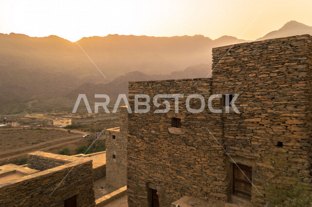 Rocky houses in the ancient stone village of Dhi Ain in the city of Al-Baha in the south of Saudi Arabia, antique heritage houses, ancient Arab architecture in Saudi Arabia, tourist attractions in Saudi Arabia