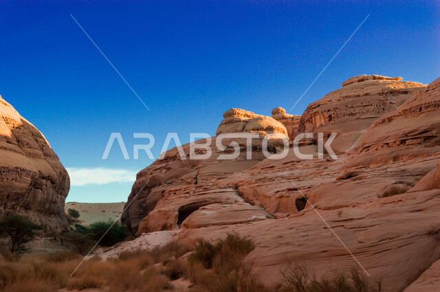 The historical beauty of Madain Saleh in Al-Ula, Saudi Arabia, the natural beauty of the rock formations, the ancient Arab civilization, archaeological tourist attractions in Saudi Arabia