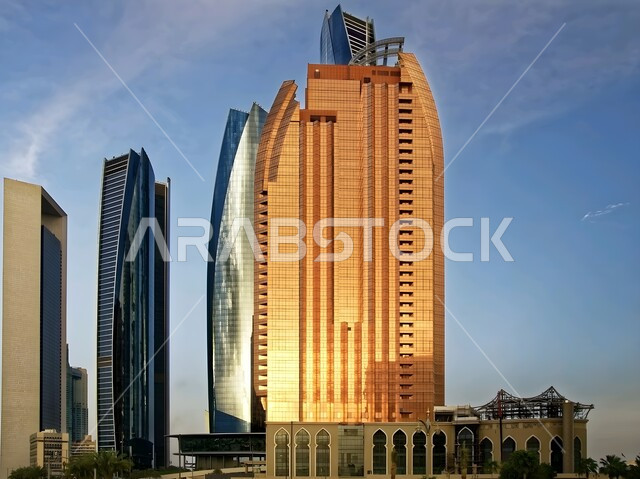 أبراج الإتحاد في وقت النهار في إمارة أبو ظبي، الفنون الهندسية المعمارية على الطراز الحديث والمتطور لناطحات السحاب في الإمارات العربية المتحدة، أماكن ومعالم مشهورة على ساحل الخليج العربي، الفنادق والمنتجعات السياحية