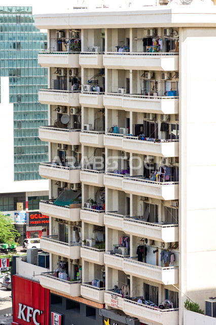 Competition and continued development of tower designs, architectural engineering art for residential and commercial buildings and facilities in the modern style, a top view of the buildings of the Al Raqqa area in the city of Dubai in the United Arab Emirates