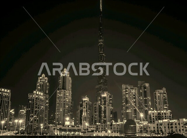 النمو والتطور العمراني للمباني والمنشآت السكنية والتجارية، الفن الهندسي المعماري على الطراز الحديث للأبراج وناطحات السحاب، جذب واستقطاب السياح من أنحاء العالم، برج خليفة في مدينة دبي المضيء ليلا، الواجهة السياحية في الإمارات العربية المتحدة
