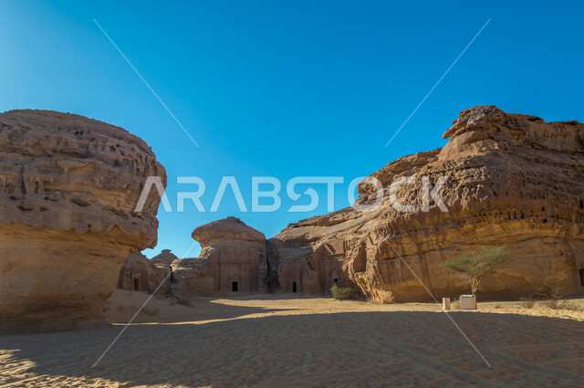 The historical beauty of Madain Saleh in Al-Ula, Saudi Arabia, the ancient Arab civilization, the natural beauty of the rock formations, the beauty of desert nature, historical archaeological landmarks, tourism in Saudi Arabia