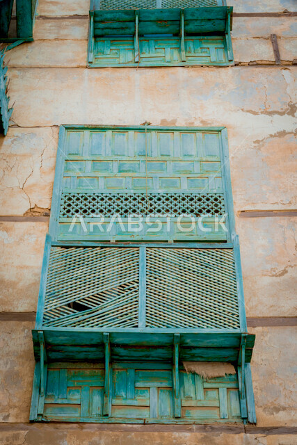 Historic antique windows in the historical city of Jeddah with an ancient Arab and Islamic architectural design, the historical country of Jeddah, attractive tourist places in Saudi Arabia
