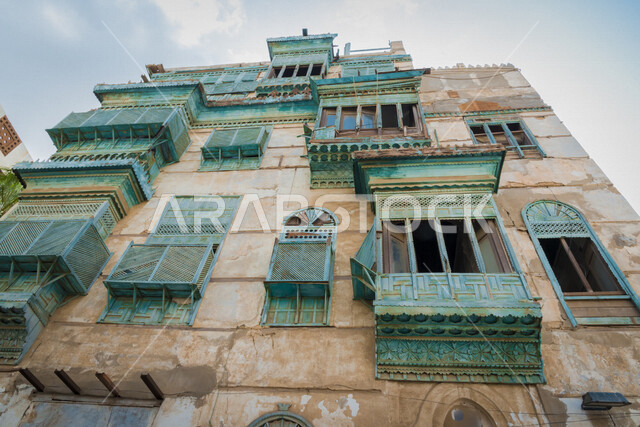 Historic antique windows in the historical city of Jeddah with an ancient Arab and Islamic architectural design, the historical country of Jeddah, attractive tourist places in Saudi Arabia