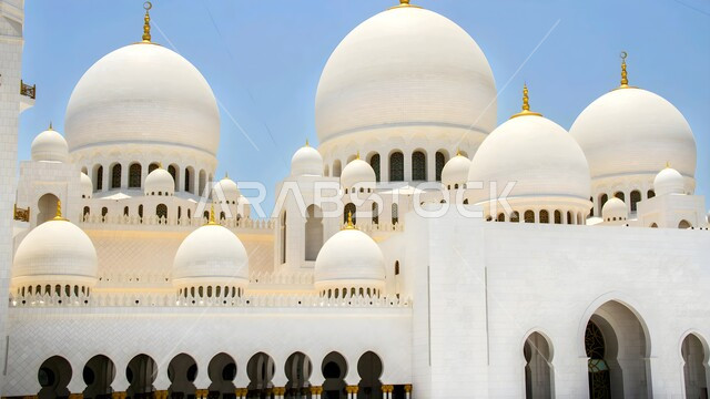 Calling Muslims to perform acts of worship and duties, the concept of worship and drawing closer to God Almighty, Islamic holy sites and landmarks, the architectural art of building domes in mosques in the United Arab Emirates, Sheikh Zayed bin Sultan Al Nahyan Mosque built in the modern Islamic style in Abu Dhabi