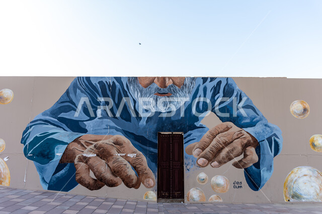 رسمة غرافيتي على مبنى تراثي في منطقة الشندغة في مدينة دبي، العمارة التاريخية القديمة, اللوحات والرسومات الجدارية, الاماكن والمعالم التراثية الأثرية  في دولة الإمارات العربية المتحدة