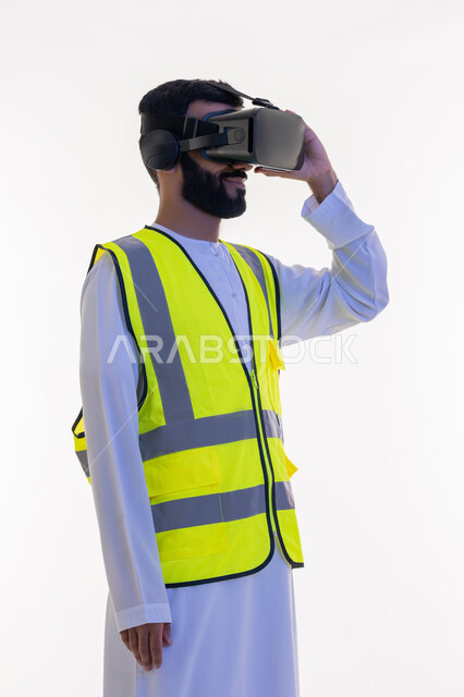 Future vision 2030, interaction with virtual engineering, portrait of an Arab Gulf Emirati engineer wearing a kandura and a work jacket and virtual reality glasses with his hand on it, integrating technology with engineering fields, growth and development of the engineering field, white background