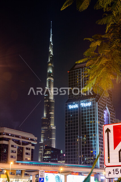 Architectural engineering art of buildings and structures in the United Arab Emirates, the growth and development of towers and skyscrapers on Sheikh Zayed Road, famous tourist places and landmarks, the progress and urban expansion in the Emirate of Dubai, the famous Burj Khalifa illuminated at night