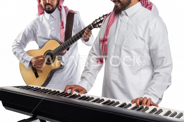 An Arab Saudi Gulf band that has artistic talents, playing the guitar, playing the piano, musical arts, practicing the hobby of playing.