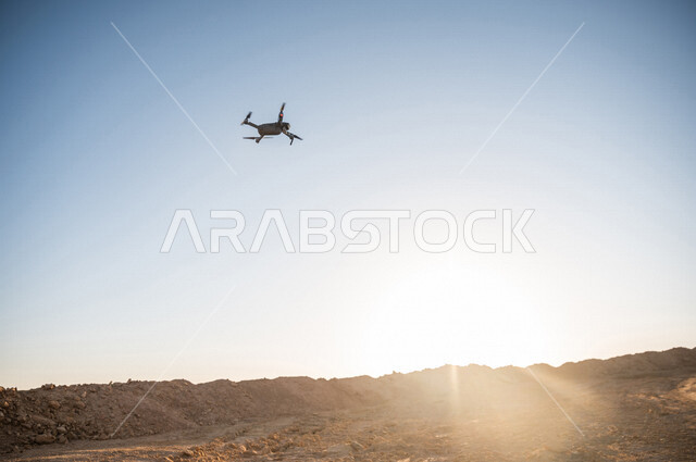 Aesthetic image in the desert of Saudi Arabia, a drone, desert nature in the daytime, stones and mountain rocks, landscapes in Saudi Arabia