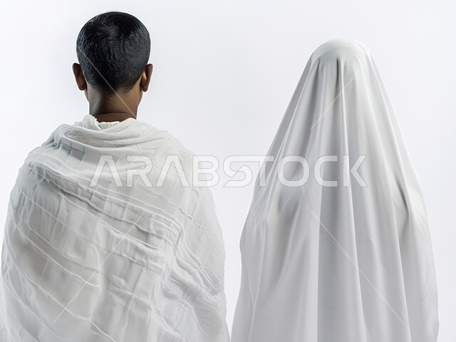 Visiting the Holy House of God in Mecca, performing the Hajj and Umrah duties during the Hajj season, the concept of intimacy between spouses, a portrait from the back of a Saudi Arabian-Khaleeji couple wearing the Ihram clothes, Islamic women and worshipers, white background.