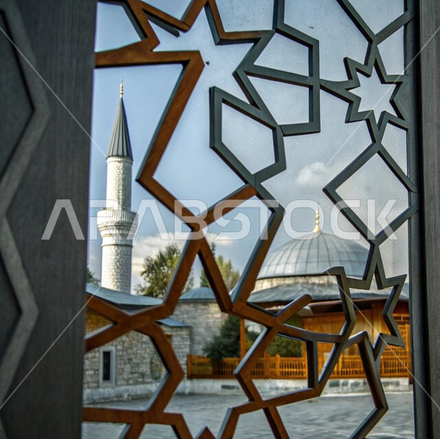 Worship and getting closer to God in the holy month of Ramadan, Islamic architectural art, elegant exterior designs and decorations of mosques in the Kingdom of Saudi Arabia, engravings and decorations on the exterior walls, spiritual Ramadan atmosphere